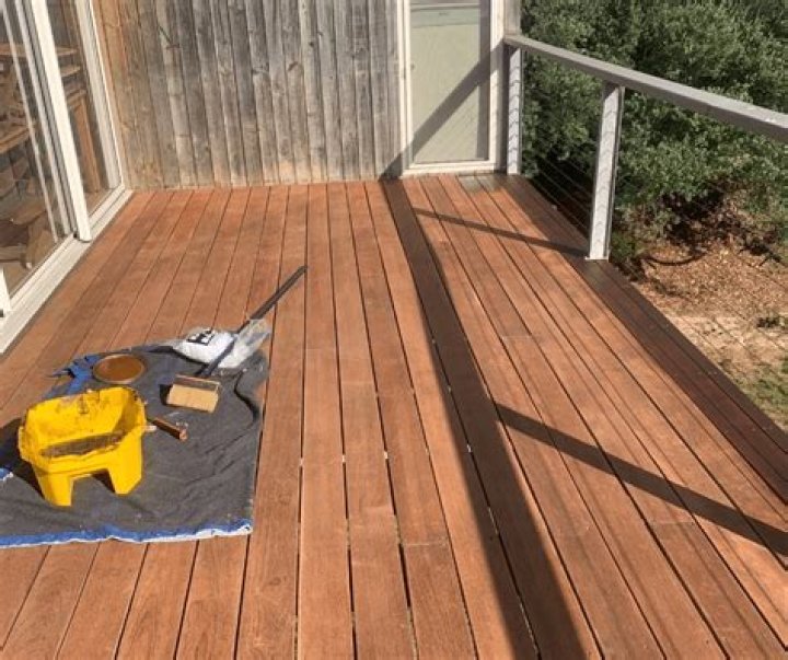 How do I know if my deck is dry enough to seal?